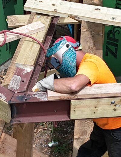 welder at a beam connection