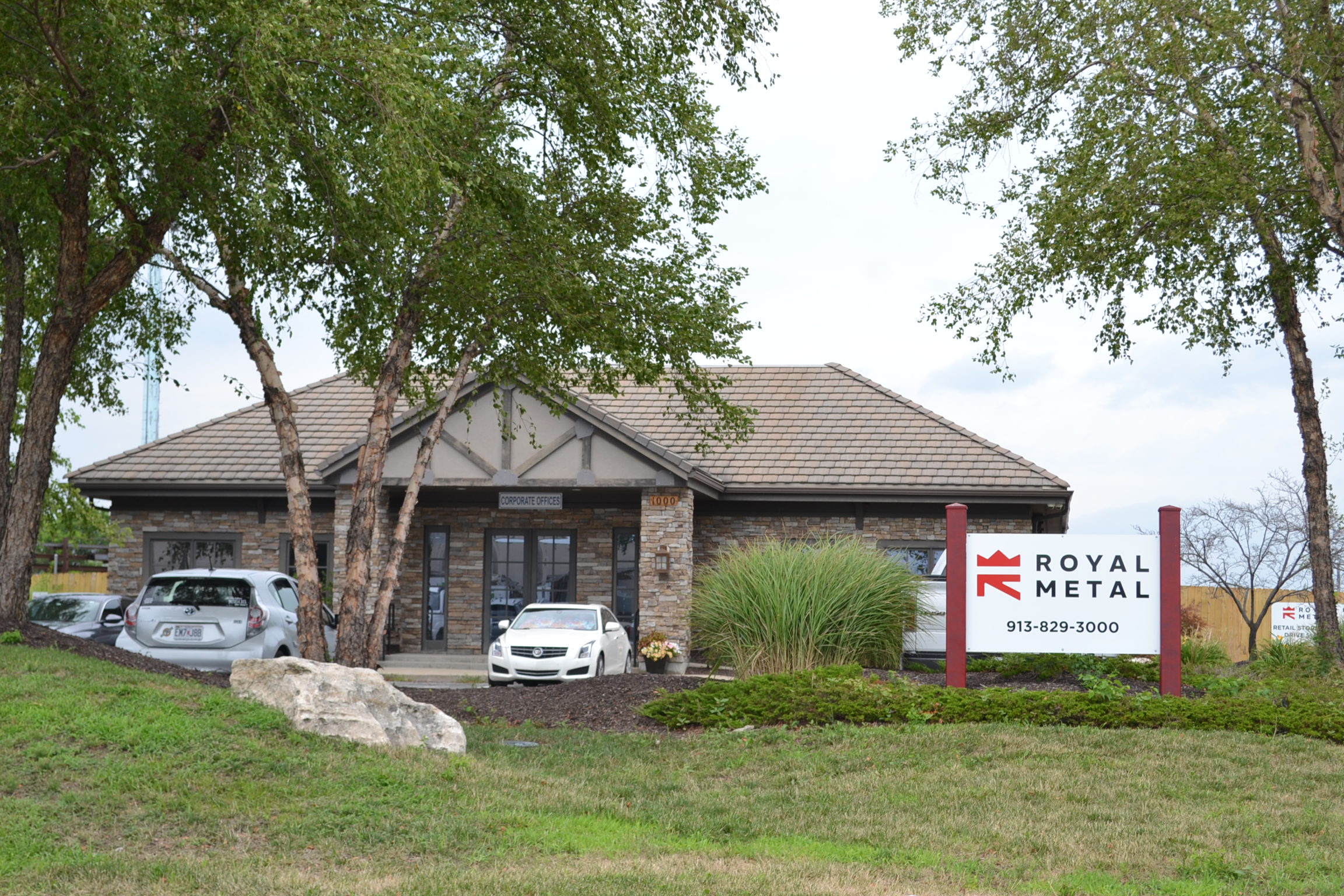 front of royal metal building with sign
